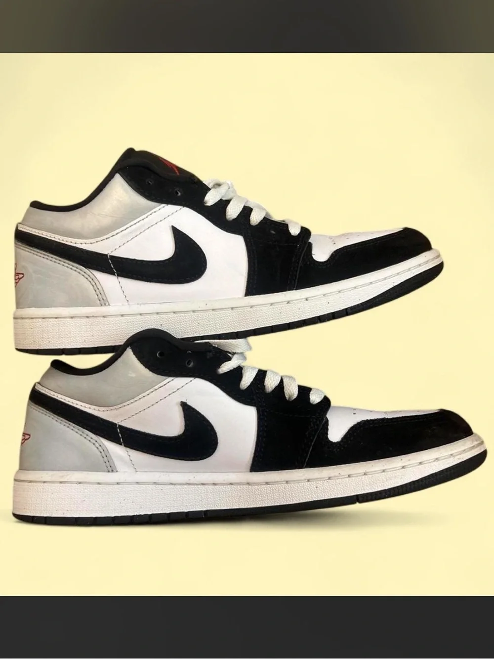 Nike Air Jordan 1 Low Black Metallic sneakers with black, white, red